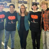 Congresswoman Hilary Scholten with a team